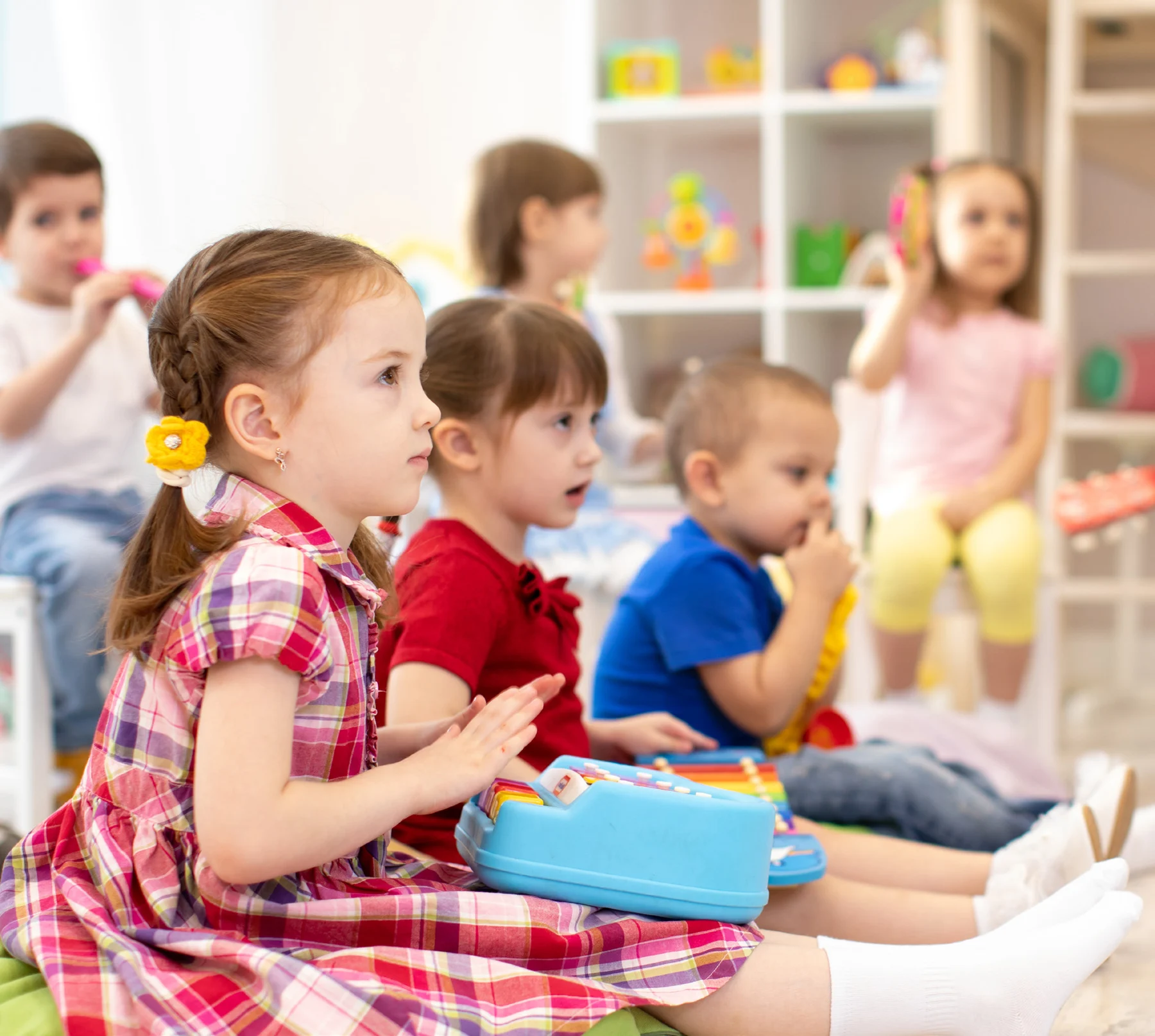 Children engaged in a classroom learning activity